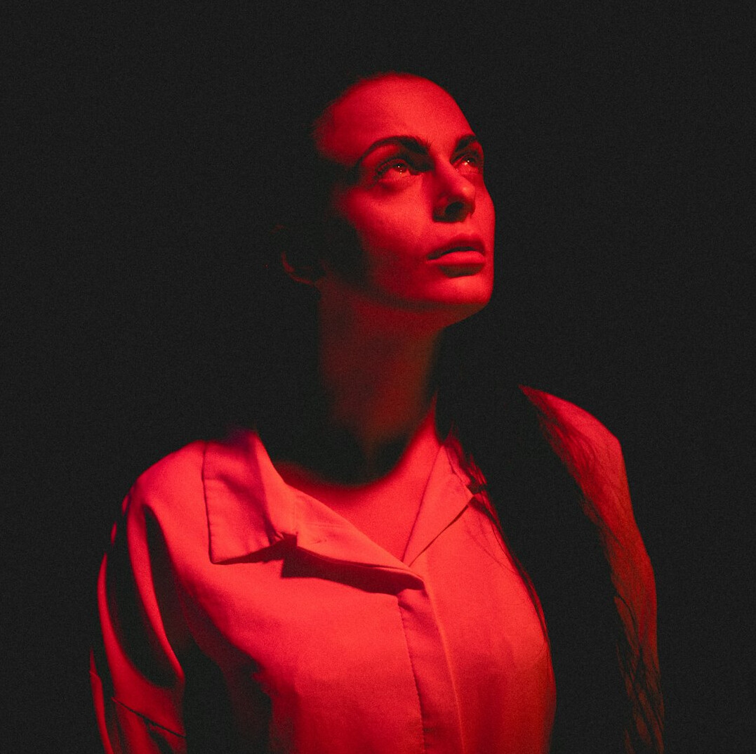 Studio portrait of a Polish female voice and presence coach in her 40s