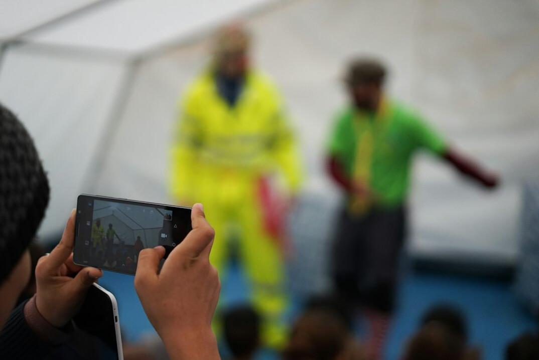 Person being filmed during a media training session